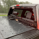 Image for article titled Lightning Strike Blasts Hunk Of Highway Through Ford Windshield, Injuring Two